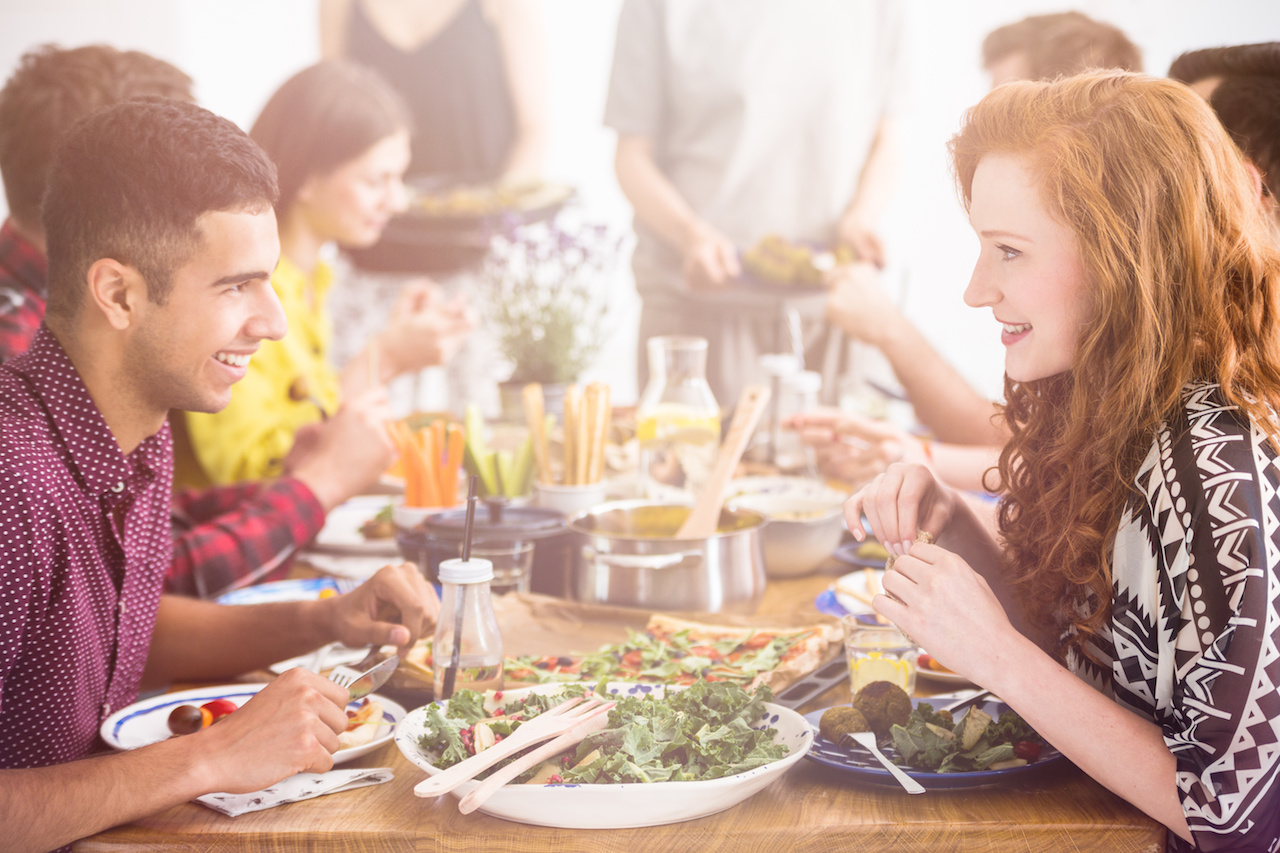 Couple Enjoying Dinner at a Vegetarian Restaurant