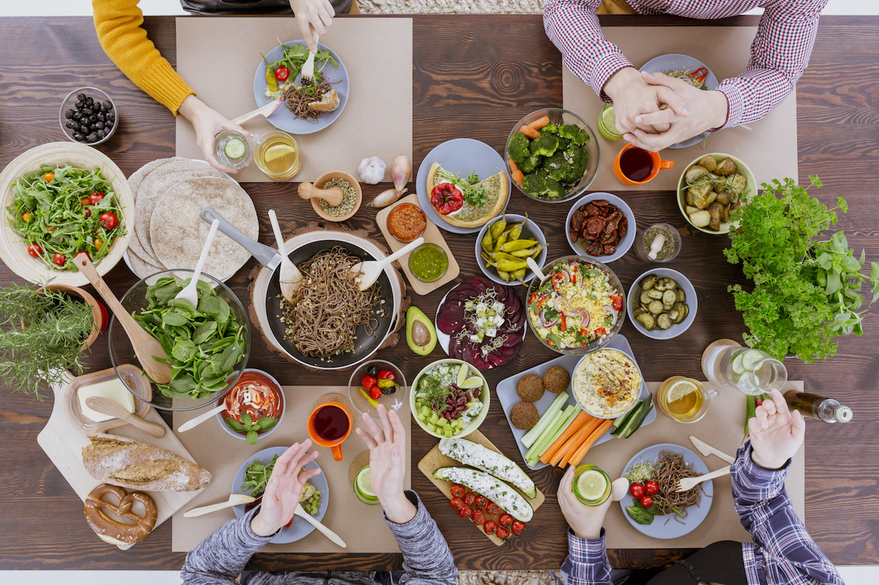 Friends Enjoying Healthy, Vegetarian Meal Together